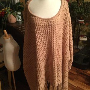 Listicle poncho has button so you have arms crocheted size medium large